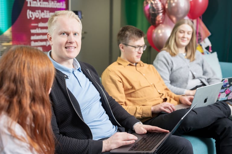 People working together on laptops