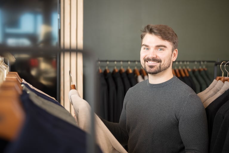 Man shopping in a clothing store
