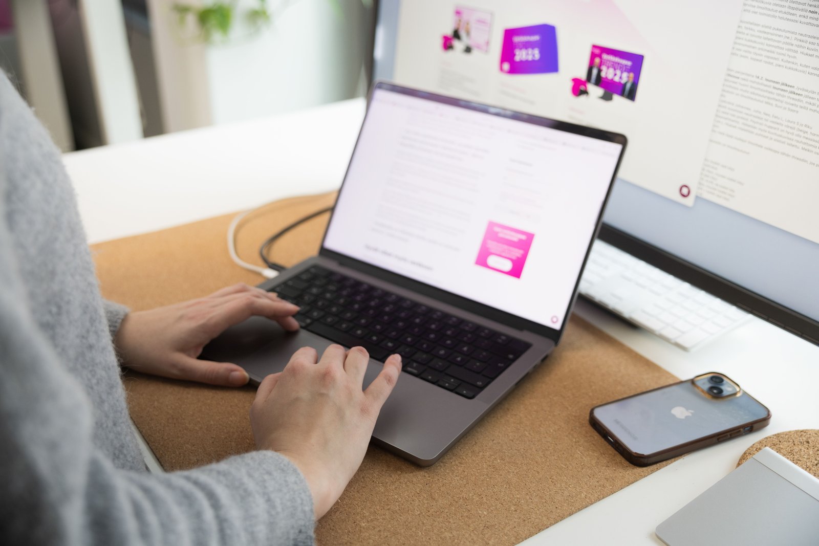 Close-up view of someone working on a computer